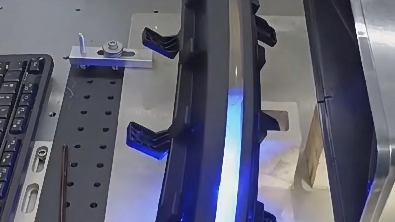 Laser paint removal for automotive interior parts
